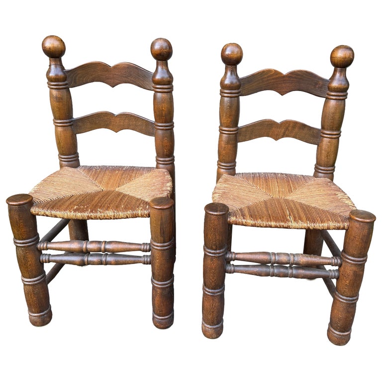 Pair of Dudouyt Fireside Oak Chairs w/ Thatch Seats