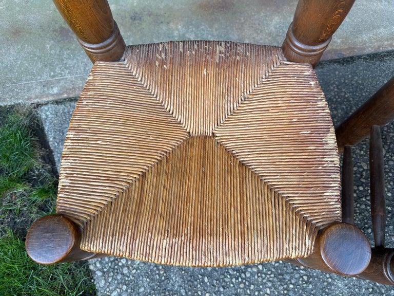 Pair of Dudouyt Fireside Oak Chairs w/ Thatch Seats