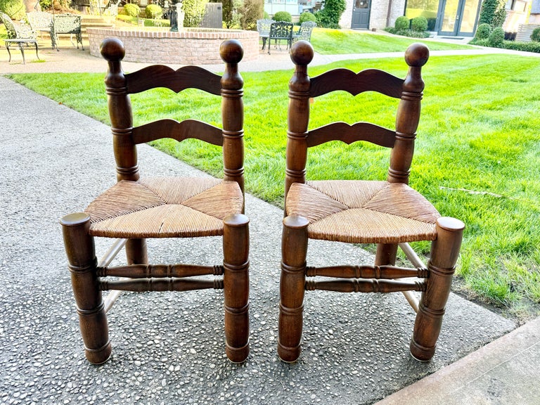 Pair of Dudouyt Fireside Oak Chairs w/ Thatch Seats