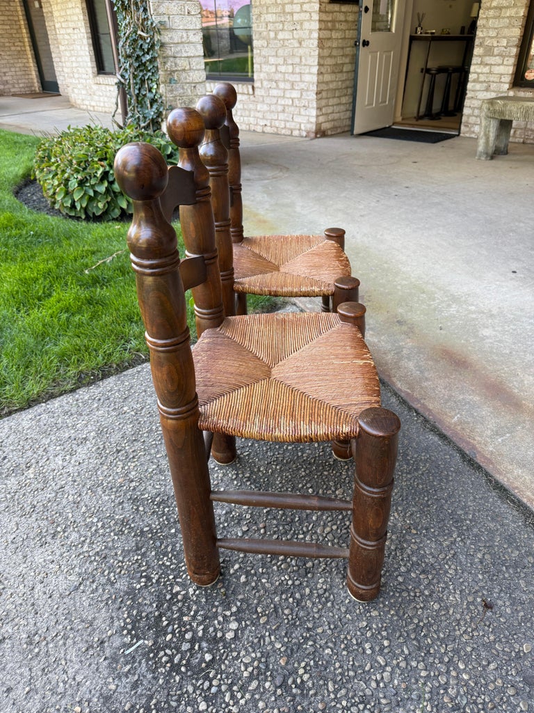 Pair of Dudouyt Fireside Oak Chairs w/ Thatch Seats