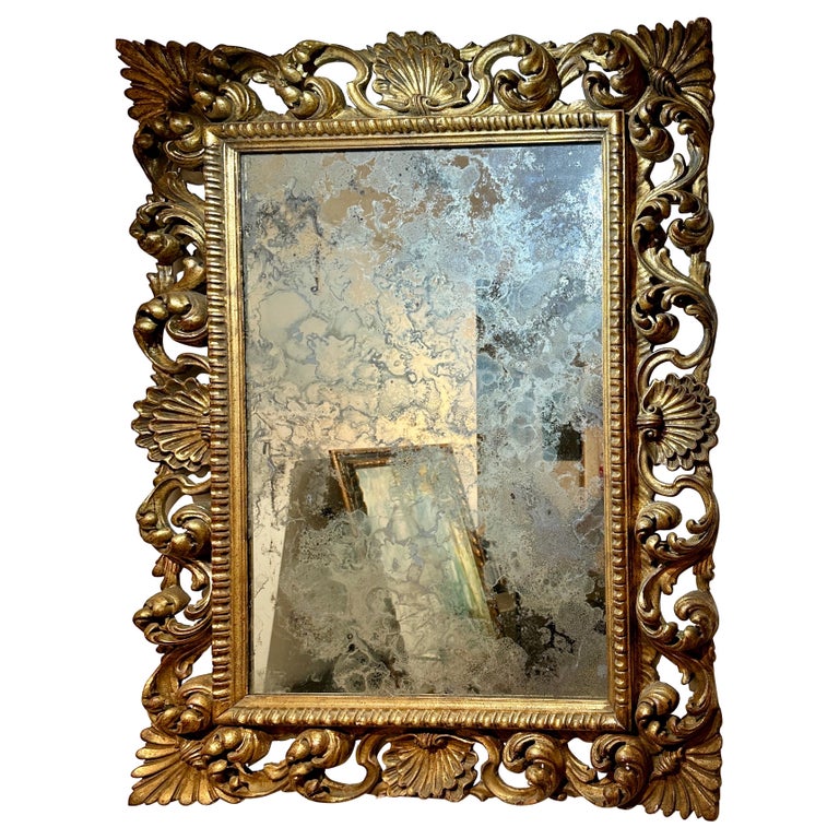 Antique Italian Carved Giltwood Frame and Antiqued Glass Wall Mirror