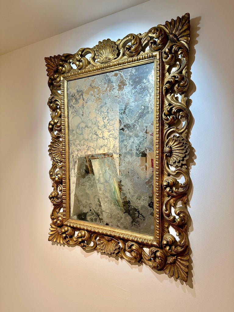 Antique Italian Carved Giltwood Frame and Antiqued Glass Wall Mirror