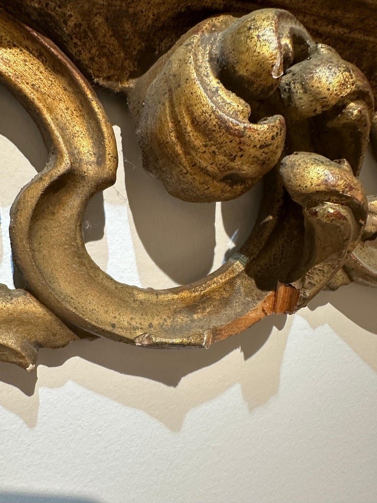 Antique Italian Carved Giltwood Frame and Antiqued Glass Wall Mirror